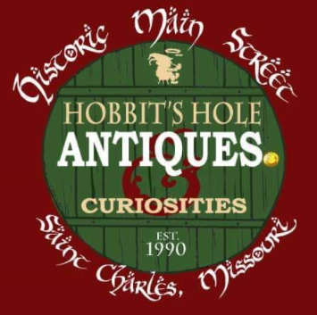 Hobbit's Hole Antiques & Collectibles and Estate Sales Logo