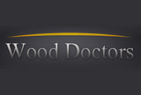 Wood Doctors Repair & Restoration Logo