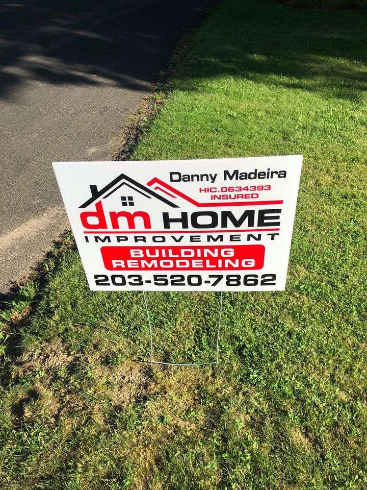 DM Home Improvement Logo