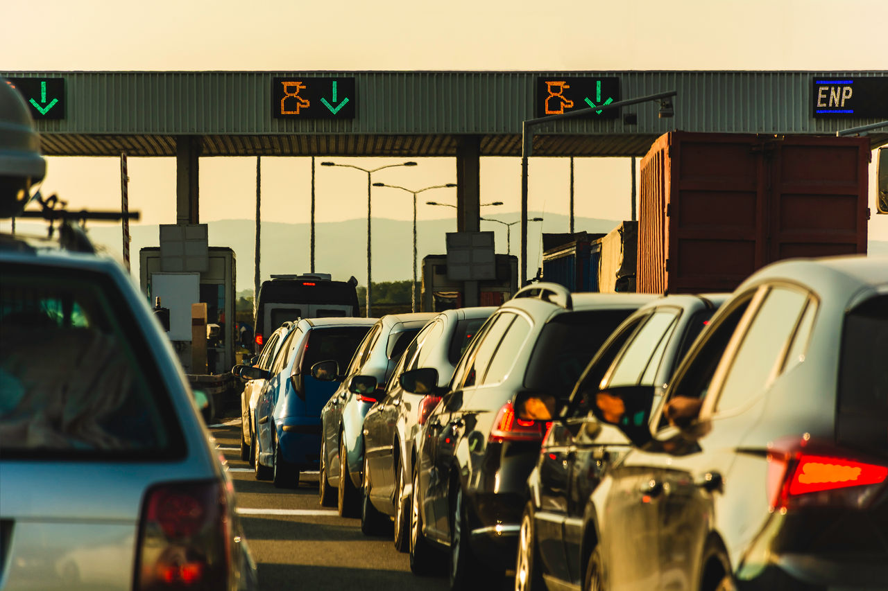 Cars waiting at highway pay toll peage