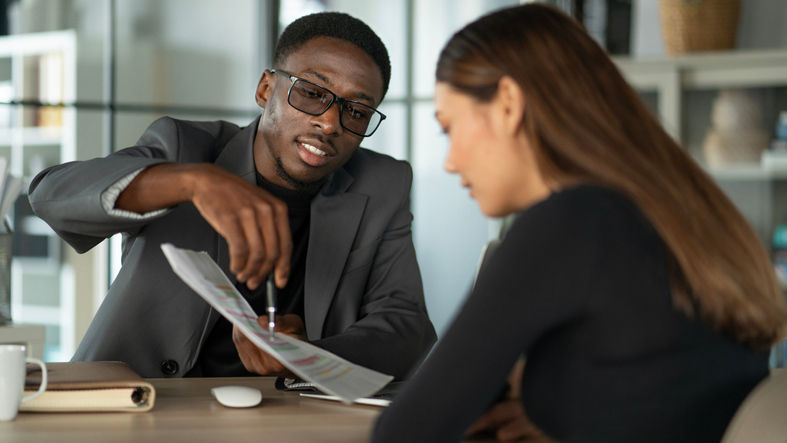 Financial advisor talking to customer