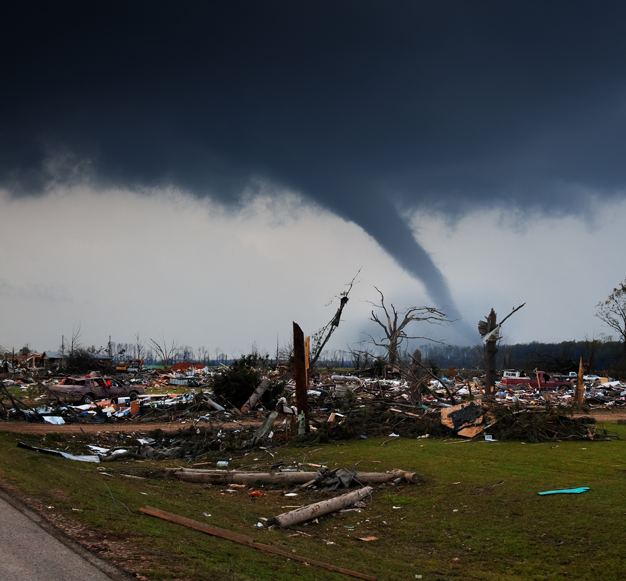 A tornado on the ground shortly after destroying a small neighborhood.