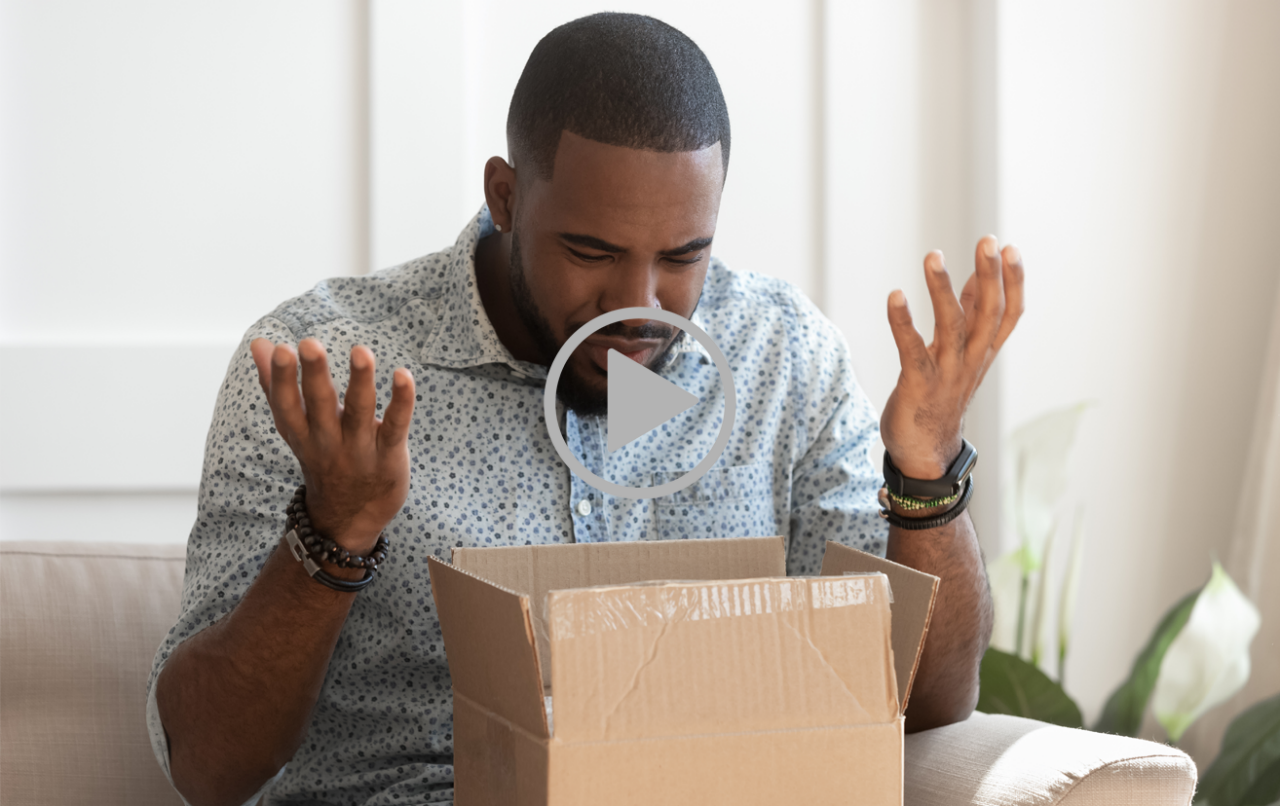 Frustrated african American millennial male buyer unpack unbox cardboard box delivery package disappointed with product quality, confused biracial man shop online open box get wrong order
