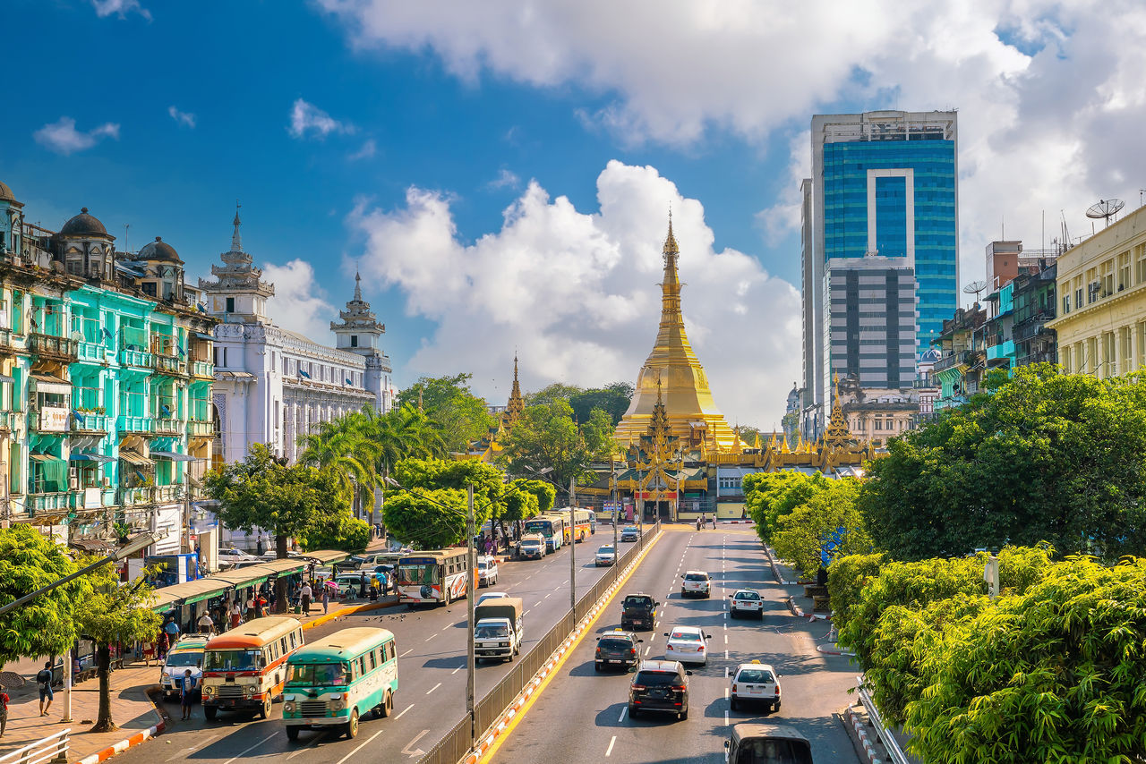 Sule pagoda in downtown Yangon, Myanmar with blue sky