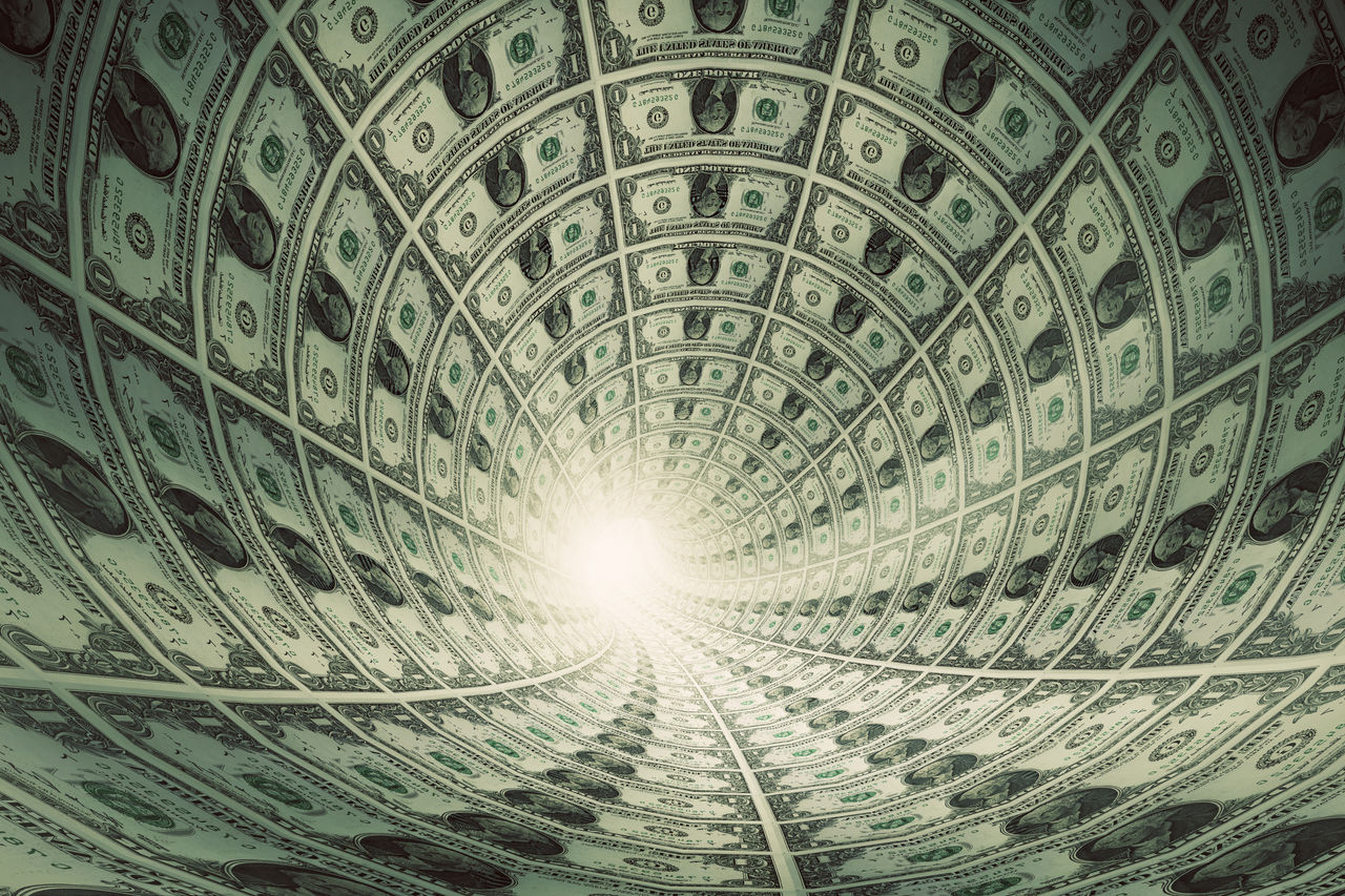 Tunnel of money, dollars towards light. Conceptual
