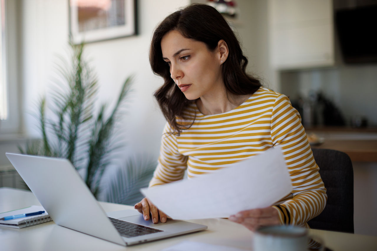 woman looking at tax information