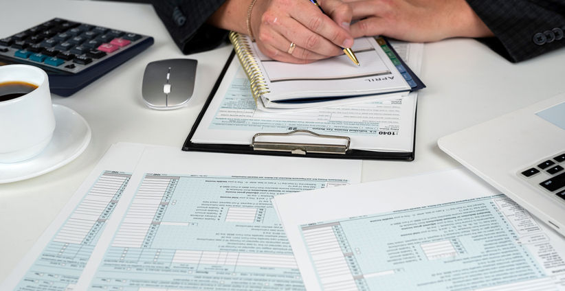man reviewing tax documents