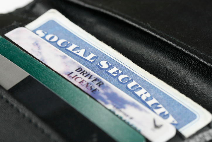 Close up of a wallet with id cards.