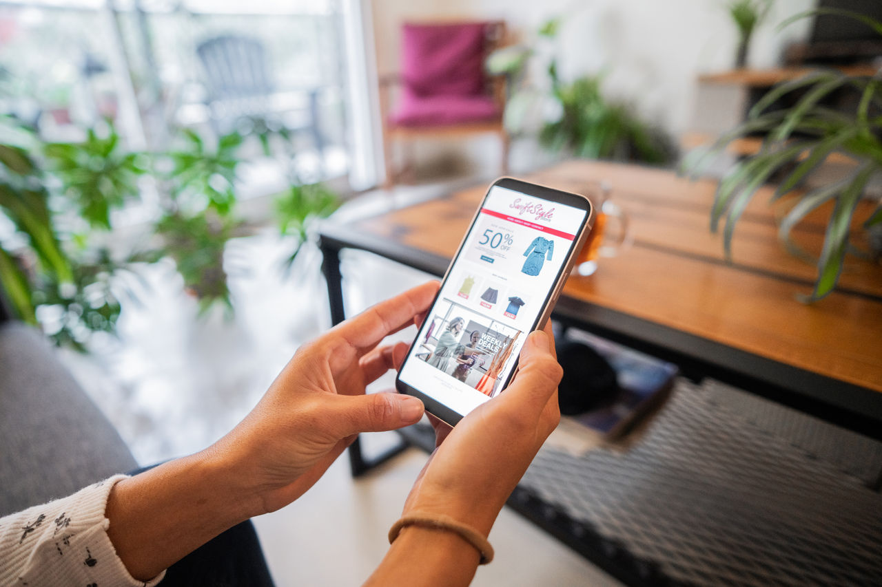 Close-up of a woman shopping online at home
