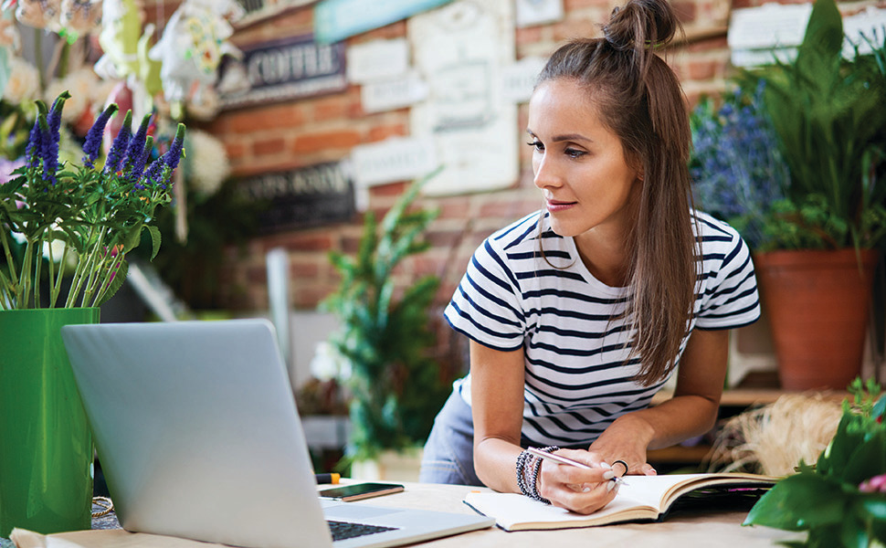 Woman using laptop for Get a Quote