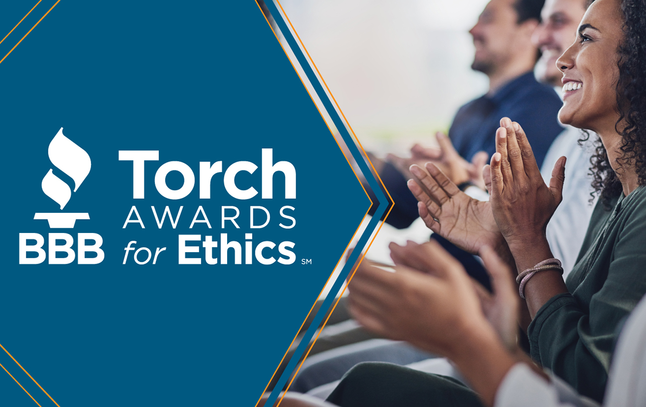 Torch Award Logo white on Blue background