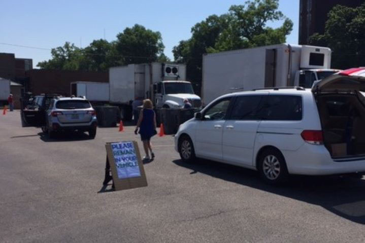 cars in line to drop of shredding