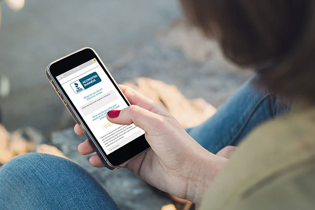 phone screen showing BBB Customer Review tool