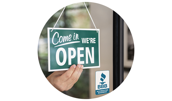 closeup of business open sign with BBB accredited business seal