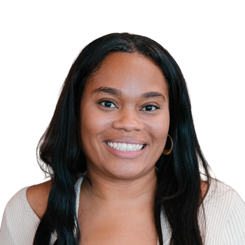 Smiling woman with long black hair and cream colored sweater