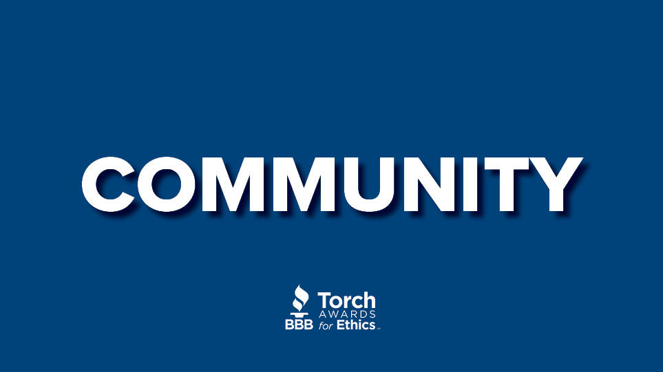 Community on dark blue background w/ Torch Awards for Ethics logo