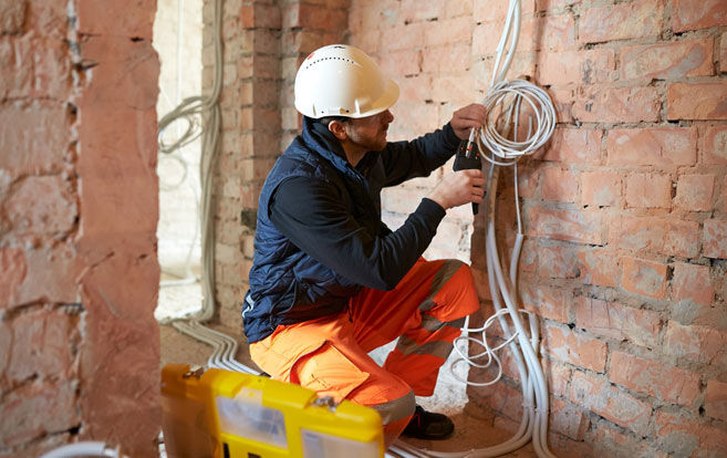 person holding smartphone looking at bbb edge content