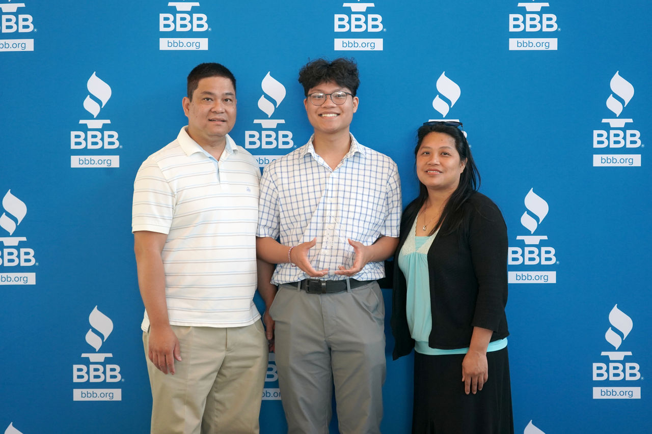 Group of individuals standing together and mingling