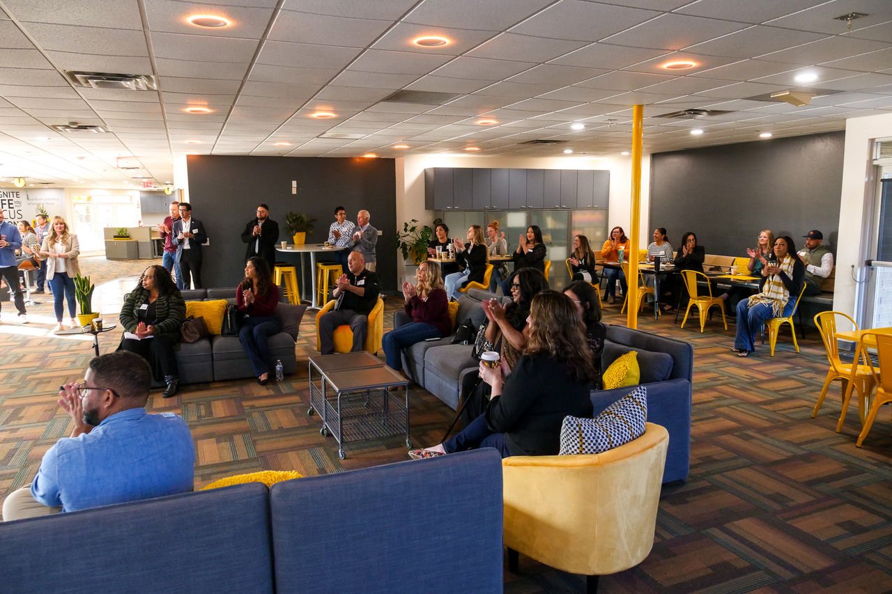 an image of the event space at ignite sparked by BBB populated with a crowd of onlookers