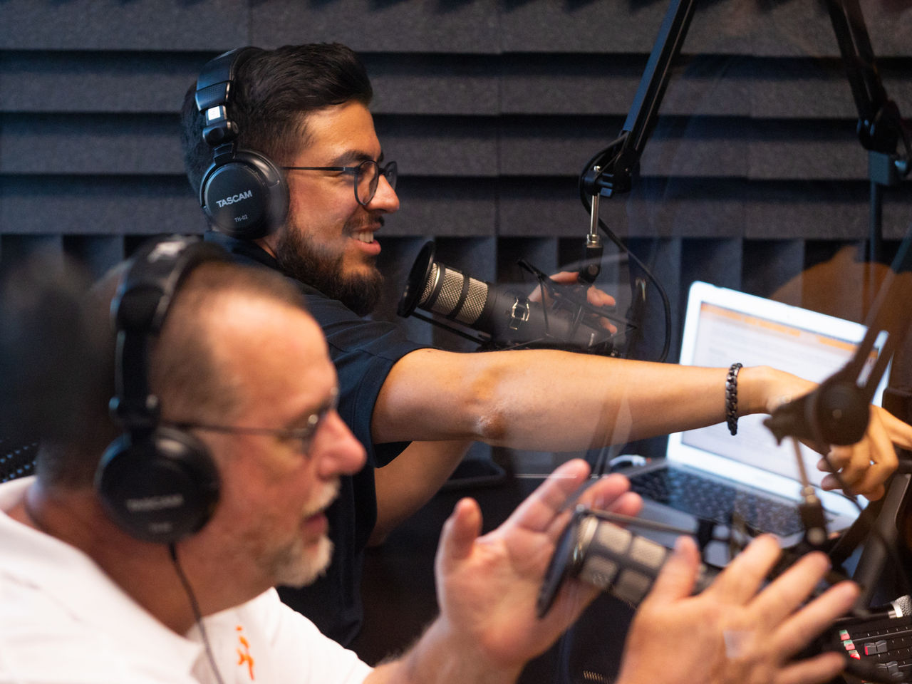 podcasters recording an episode at the BBB podcast studio