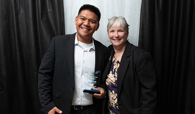 Picture of Better Business Bureau CEO Lynn Conner and Spark Award winner CTubbz Detail