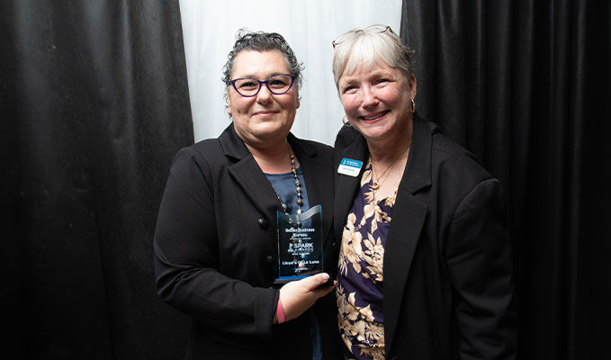 Picture of Better Business Bureau CEO Lynn Conner and Spark Award winner Lloyd's of La Luna