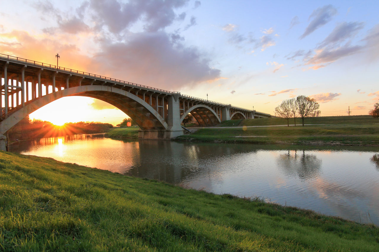 The Trinity River flowing under the Paddock Viaduct in Fort Worth, TX.
