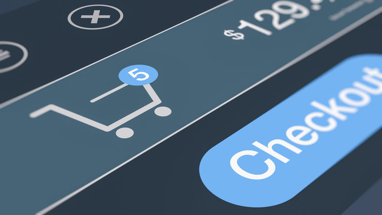 woman holding credit card looking frustrated