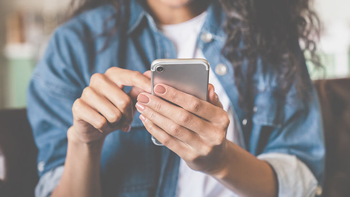 Close up of woman browsing on her phone