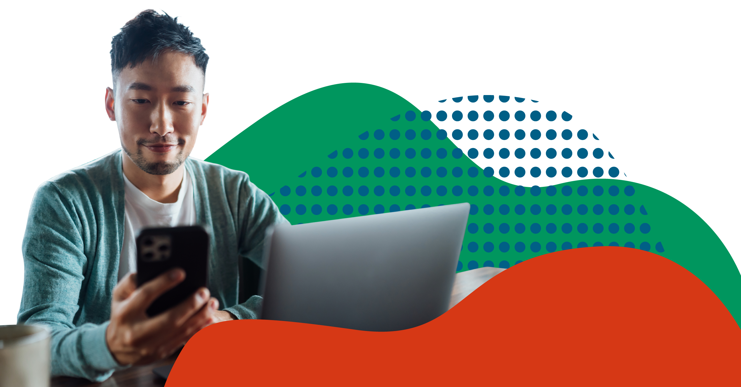 man smiling holding smart phone and credit card