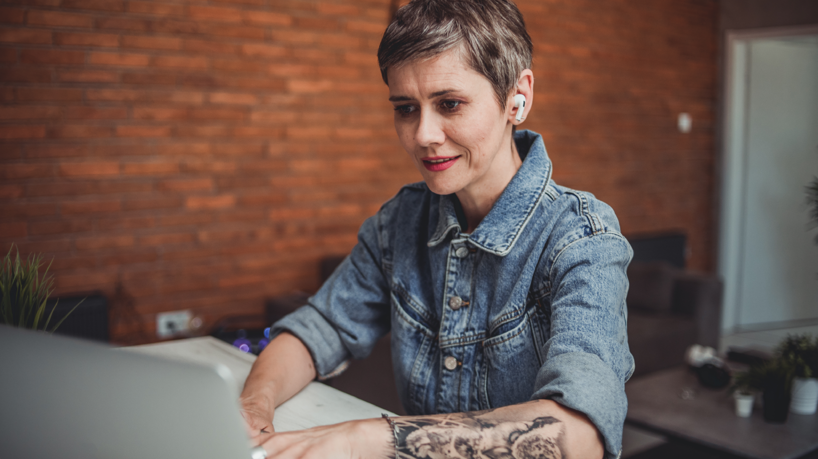 Person on laptop in home office