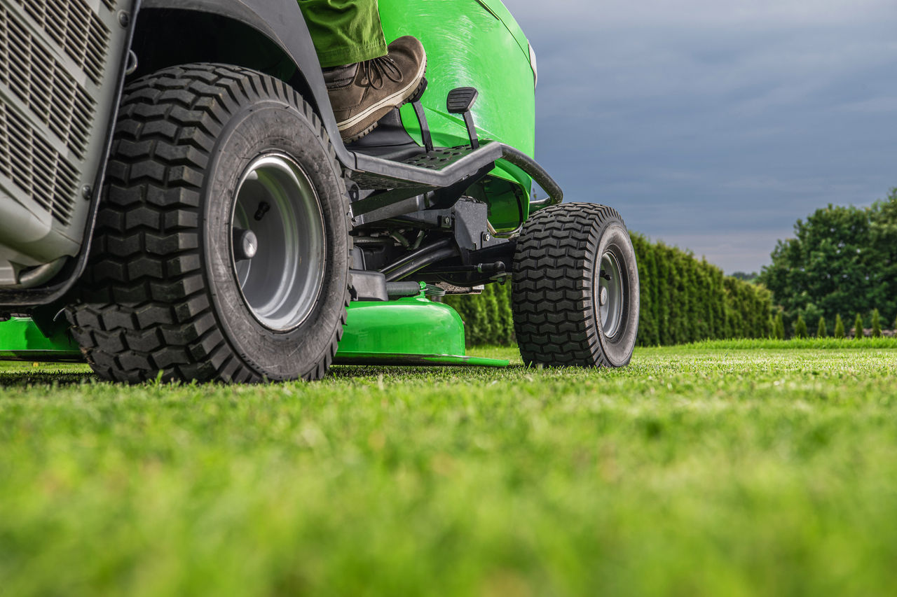 lawn tractor cutting grass