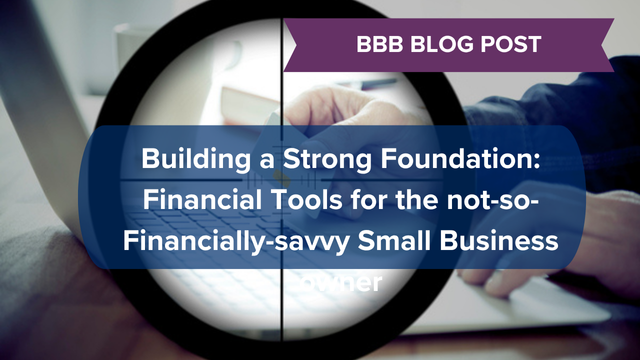 A magnified view of hands typing on a laptop, overlaid with a blog post title about financial tools for small business owners.