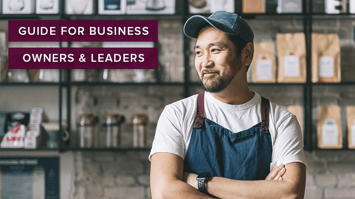 Man smiling in his coffee shop with text "Guide for business owners and leaders"