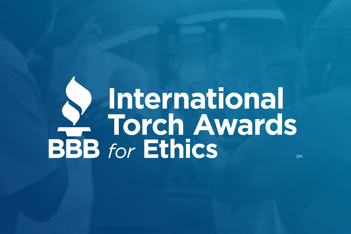 BBB torch logo and "International Torch Awards for Ethics" in white over blue background