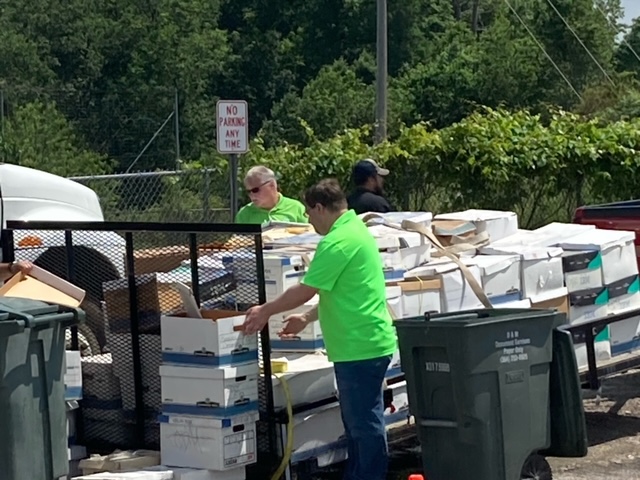 picture of trailer containing boxes of items to be shred
