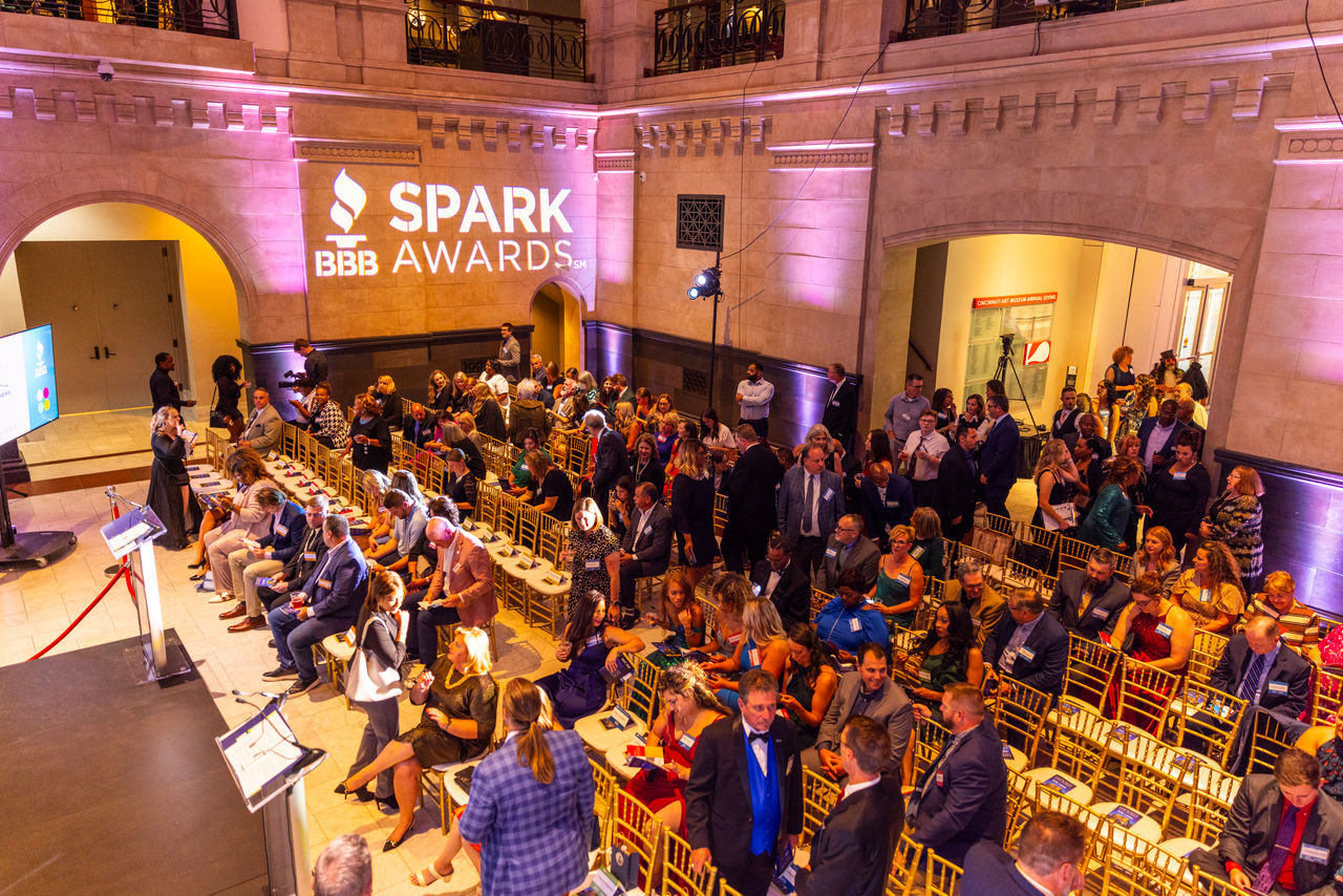 Guests begin finding their seats for the 2023 Torch and Spark Awards show in Cincinnati Art Museum’s Great Hall.