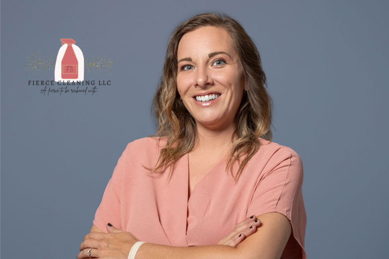 false Fierce Cleaning LLC logo that reads "a fierce to be reckoned with" with headshot of Heather Dalton, Owner