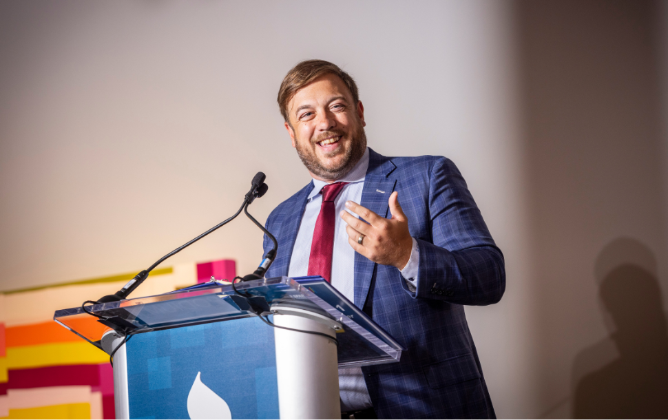 BBB Cincinnati Board Chair Aaron Stapleton reveals a Torch Awards for Ethics winner.