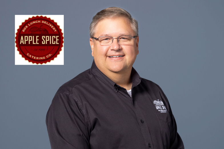 false Apple Spice Junction logo with headshot of Doug Siebenburgen, Owner & General Manager