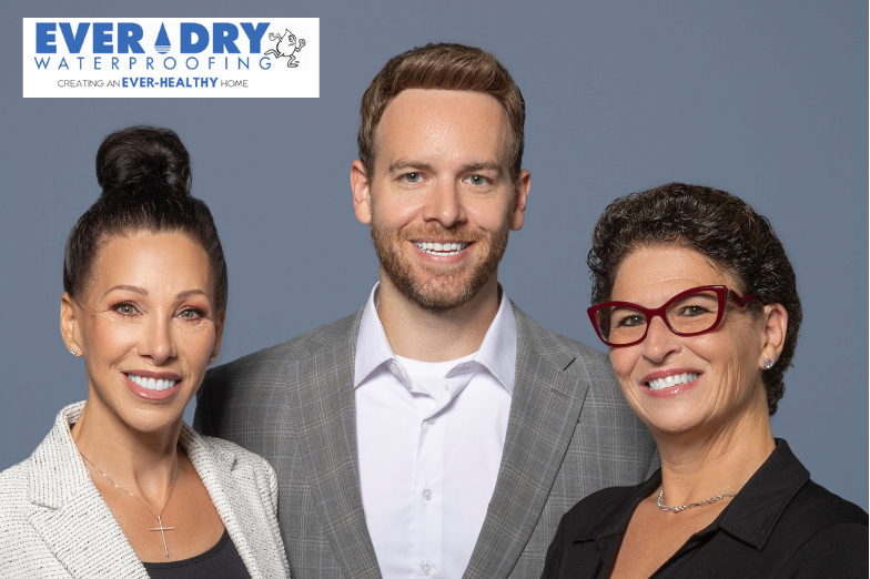 false Everdry Waterproofing of Cincinnati logo with headshot of Kate Oleksiak, Owner; James Begley, General Manager; and Mary Kelly, Owner