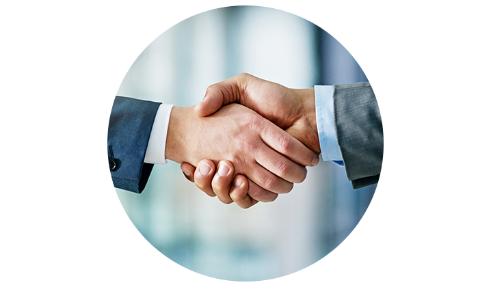 Closeup shot of two unrecognisable people shaking hands