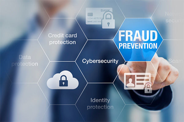 a man clicking a button that says fraud prevention