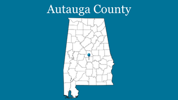 Blue background with outline of Alabama with blue pin on Autauga County and the words Autauga County up top