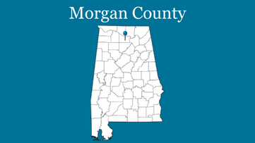 Blue background with outline of Alabama with blue pin on Morgan County and the words Morgan County up top