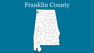 Blue background with outline of Alabama with blue pin on Franklin County and the words Franklin County up top