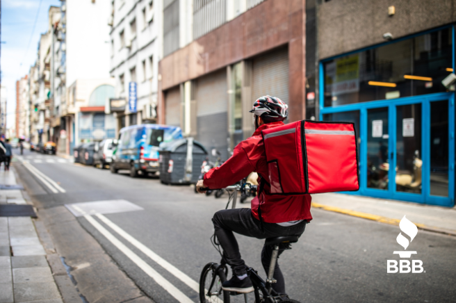 Food delivery person on bicycle