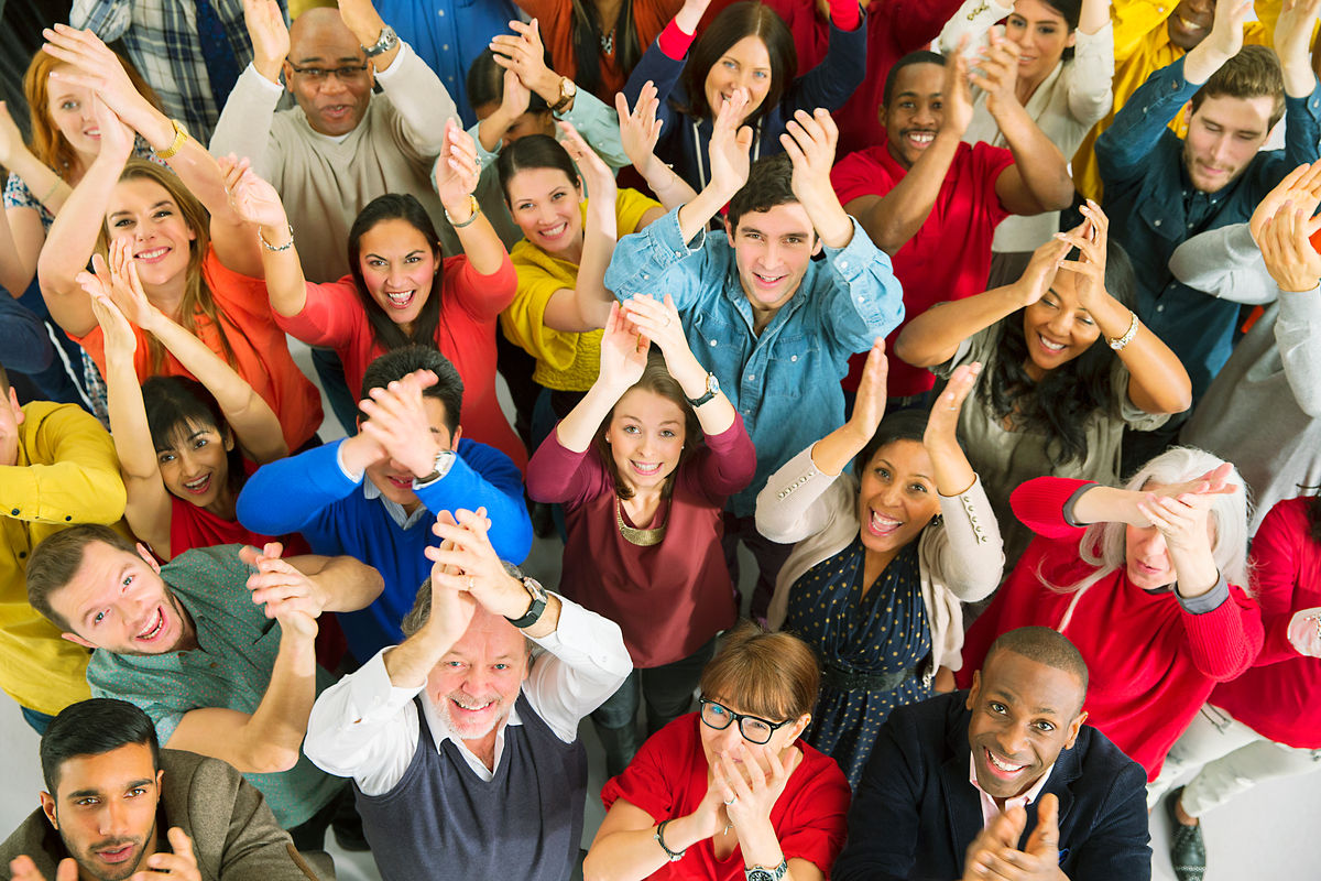 overhead view of people applauding