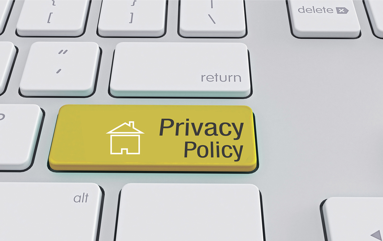 White Keyboard with privacy policy - stock photo