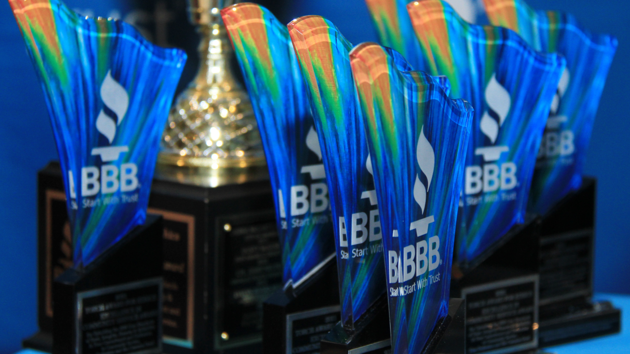 Multicolored trophies on black stand